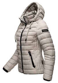 Light beige puffer jacket with a hood, quilted design, black zippers, and drawstring accents. Features a logo on the sleeve and textured cuffs.