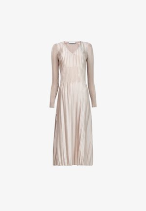 Pleated midi dress in a soft beige hue, with long sleeves and a V-neckline, featuring vertical texture and a fitted waist.