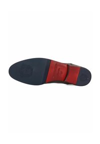 Suela de zapato hecha de goma y cuero con una base azul. Presenta un acento rojo con logotipo en relieve y ranuras horizontales para tracción.