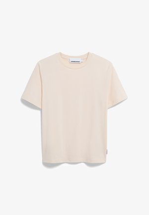 T-shirt beige clair à manches courtes, fabriqué en tissu doux, avec un col rond et une coupe droite. Étiquette visible en bas à gauche.