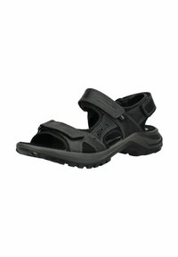 Sandalo nero con cinturini regolabili in velcro, design aperto sulla punta e suola in gomma testurizzata per aderenza e durabilità.