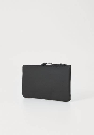Black pouch wallet made of smooth fabric, featuring a zip closure at the top and an adjustable strap for easy carrying.