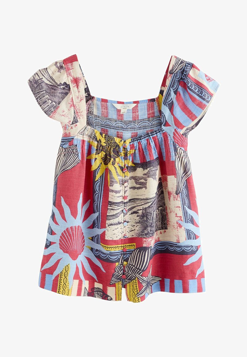 Blouse en lin colorée à manches bouffantes, avec des motifs de coquillages, poissons et soleil en rouge, bleu, jaune et beige, et des boutons sur le devant.