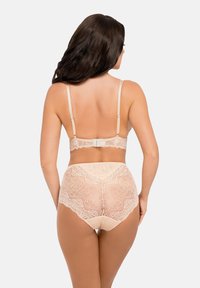 Spetsbh och högmidjade trosor i nude. Har justerbara band, blommönster och detaljerad spetskant för ett delikat utseende.