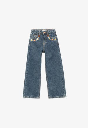 Jeans de denim de pierna ancha en un lavado azul oscuro, con bordados florales en blanco y rojo en la cintura. Diseño clásico de cinco bolsillos.
