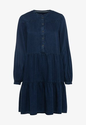 Mørk denimkjole med lange ærmer, rund halsudskæring, knaplukning og en tiered nederdel. Blød tekstur med en afslappet pasform.