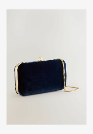 Navy velvet clutch bag with a gold-tone frame, a decorative clasp, and a detachable chain strap. Smooth texture and compact rectangular shape.