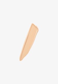 Beige-kreeminen väripala, jossa on sileä rakenne, näyttäen hieman kaarevalta ja kiiltävältä valkoista taustaa vasten.