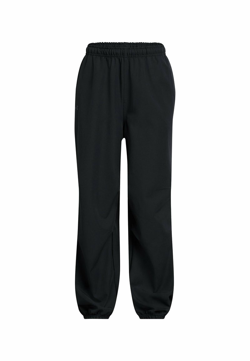 Svarta träningsbyxor med elastiskt midjeband, tapered cuffs och mjukt, lätt material. Slät textur, inga synliga mönster eller metalldelar.