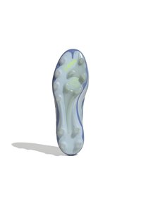 Football cleat sole in translucent white with light blue accents, featuring six rounded studs and a circular design. "Copa" printed in yellow.