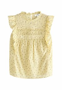 Żółta bluzka w szary wzór w kropki, z falbankami na rękawach i smockowanym dekoltem. Lekki materiał, okrągły dekolt i marszczona tkanina.