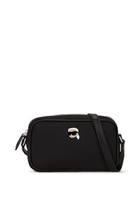 Svart skulderveske med glatt tekstur, glidelåslukking og justerbar stropp. Har en tegneserie-logo på forsiden.