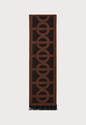 Écharpe marron avec un motif circulaire géométrique en marron foncé, avec des extrémités frangées, fabriquée dans un matériau doux et texturé.