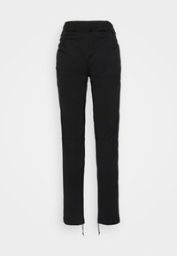 Black pants with an elastic waistband, tapered design, and drawstring at the hem. Made from smooth fabric with side pockets.