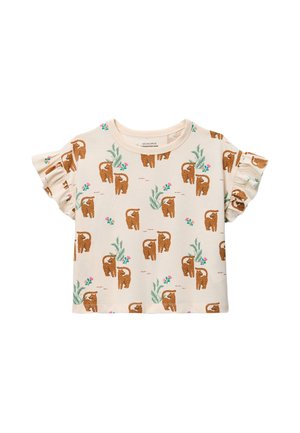 Chemise à manches courtes couleur crème avec des manches à volants, présentant un motif de léopards marrons, de feuilles vertes et de petites fleurs roses.