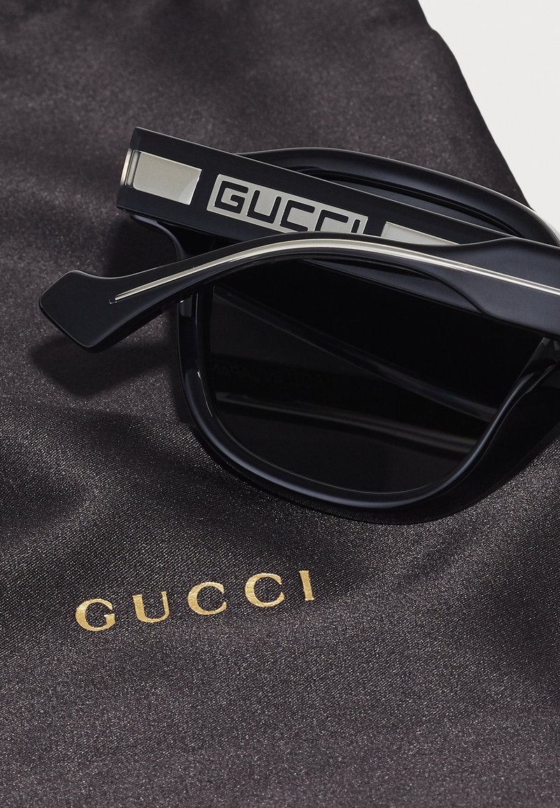 Gucci Lunettes de soleil - black/crystal/grey