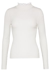 Vit ribbad långärmad topp med hög krage som har en delikat volangkant och ett texturerat stickmönster på den övre delen.