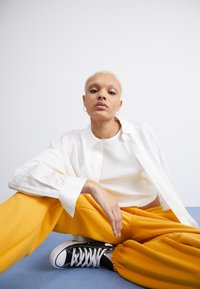Jordan PANT - Trainingsbroek - yellow ochre
