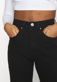Cotton On STRETCH - Calças de ganga de perna direita - black