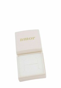 Scatola per gioielli rosa chiaro con testo dorato "amor" sul coperchio, dotata di un morbido interno bianco e di un inserto sagomato per tenere gli oggetti in modo sicuro.