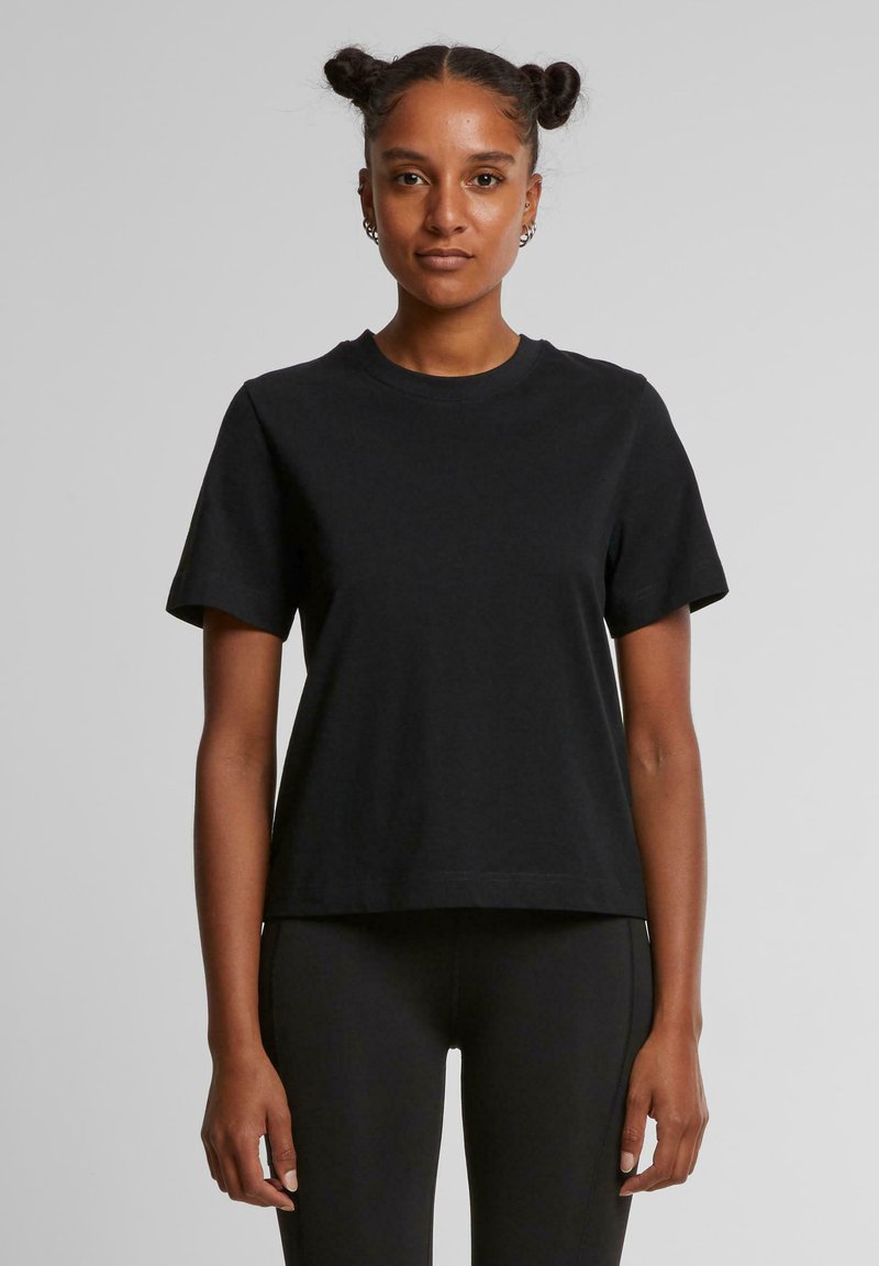Zwarte katoenen t-shirt met een ronde hals en korte mouwen, met een ontspannen pasvorm en een gladde textuur. Geen zichtbare patronen of accenten.
