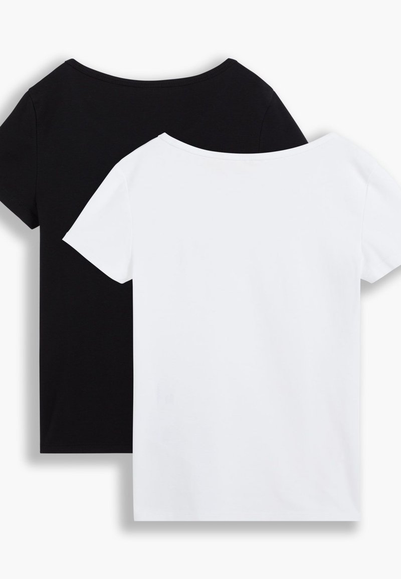 Camisetas de cuello redondo en blanco y negro expuestas espalda con espalda, con mangas cortas y una textura de tela suave y lisa.