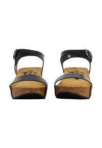 Sandali in pelle nera con due cinghie regolabili, soletta in sughero e suola testurizzata. Design semplice che enfatizza comfort e praticità.