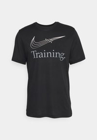 Camiseta de algodón negra con el logo blanco de Nike y "Training." impreso en gris. Diseñada con mangas cortas y cuello redondo.