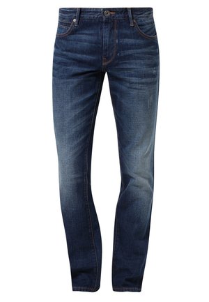 Jean en denim bleu foncé avec une coupe slim, légère décoloration au niveau des cuisses, style cinq poches et fermeture bouton à la taille