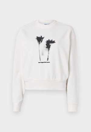 Biely skrátený mikina s čiernou kvetinovou grafikou a textom "karl lagerfeld jeans". Mäkko materiál s rebrovanými manžetami a výstrihom.