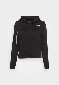 Sudadera con cremallera negra de tejido texturizado, con bolsillos frontales y el logo de "The North Face" en el pecho y la manga izquierda. Cuenta con capucha.