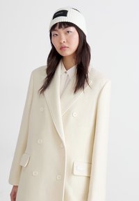 COACH PATCH HEADBAND - Grijači za uši - chalk