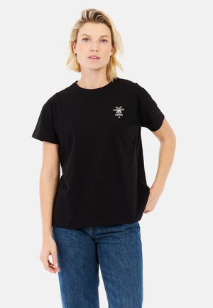 T-shirt en coton noir à manches courtes et encolure ronde. Doté d'un petit graphique de palmier blanc sur la poitrine et d'une coupe décontractée.