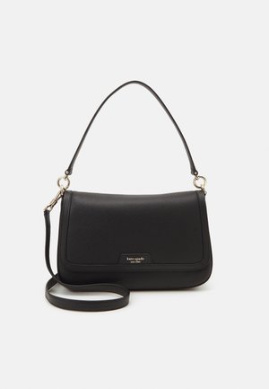 Black leather handbag with a textured surface, a single top handle, and an adjustable shoulder strap. Features a gold-tone logo plate.