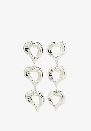 Srebrnonijžne uhane v obliki srca s povezanim dizajnom kapljice, ki vsebuje izrezane detajle in sijajno površino. Tekstuirana površinska obdelava.