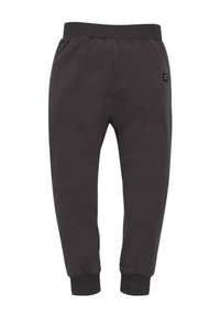 Dunkelgraue Jogginghose aus weichem Stoff mit elastischem Bund, schmal zulaufenden Bündchen und einem kleinen Logo-Etikett an der Seite.