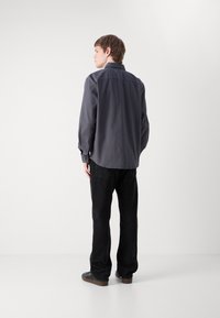 Calvin Klein Jeans GARMENT DYE SHIRT - Srajca - ebony