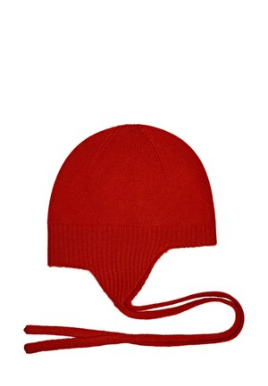Bonnet d'hiver rouge tricoté avec des caches-oreilles et de longs liens suspendus de chaque côté.