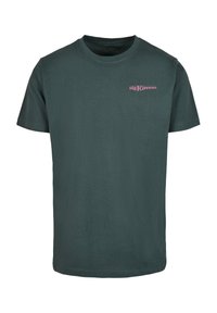 Dark green cotton t-shirt with a crew neck and short sleeves, featuring pink text "DIE FLIPPERS" on the left chest. Smooth texture, standard fit.
