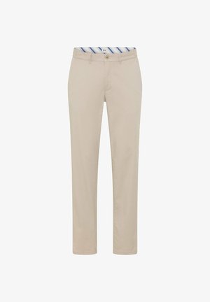 Beige afslappede bukser med linning, knap, bæltestropper og lynlås foran, vist fladt mod hvid baggrund.