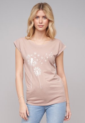 Lyserød bomulds T-shirt med opfoldede ærmer, prydet med hvid dandelion grafikdesign. Blød tekstur, tætsiddende pasform og rund halsudskæring.