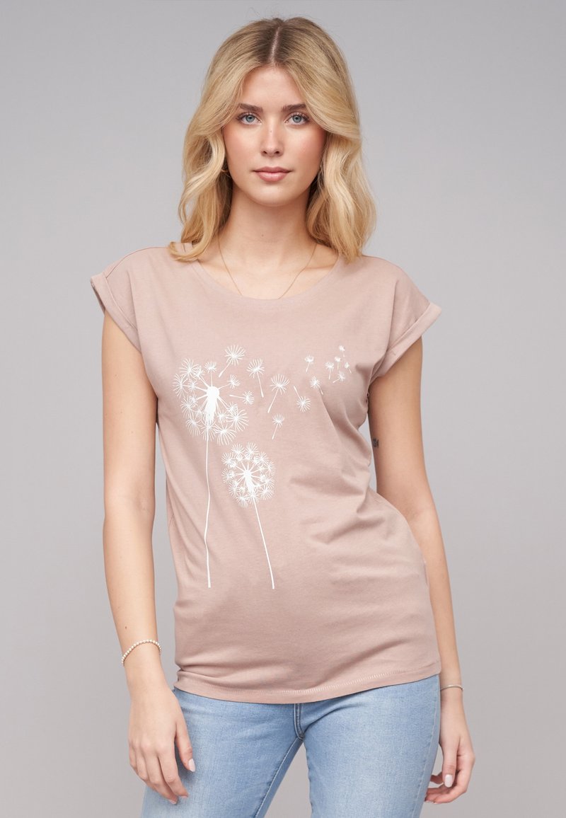 Lyserød bomulds T-shirt med opfoldede ærmer, prydet med hvid dandelion grafikdesign. Blød tekstur, tætsiddende pasform og rund halsudskæring.
