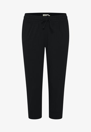 Crne trenirke s elastičnim pojasom, vezicom i bočnim džepovima. Materijal je mekan s glatkom teksturom, sužen prema gležnjevima.