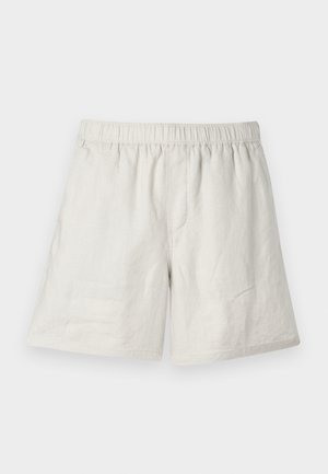 Helle beige Leinen-Shorts mit elastischem Bund, die eine lockere Passform und minimale Nähte für ein einfaches, lässiges Design bieten.