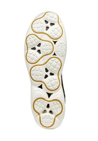Suela de deportivas blancas con patrones de tracción circulares y hexagonales, con acentos marrones que delinean los contornos del diseño. Superficies lisas y texturizadas.