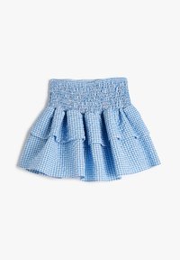 Jupe en vichy bleu et blanc avec une taille smockée et plusieurs volants, fabriquée en tissu léger avec une finition texturée.