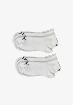 Weiße Baumwollsocken mit schwarzen Logo-Akzenten. Sie verfügen über einen gerippten Bund und ein niedrig geschnittenes Design, das sich für Sportbekleidung eignet. Weiche Textur.