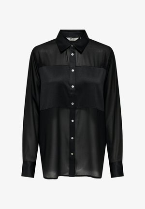 Sort skjorte med knaplukning og et semi-gennemsigtigt øverste afsnit. Har en spids krave, lange ærmer og fem knaplukninger foran.