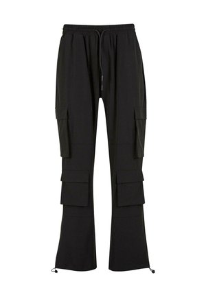 Black cargo pants made of soft fabric, featuring multiple side pockets, elastic waistband with drawstring, and tapered legs with adjustable hems.