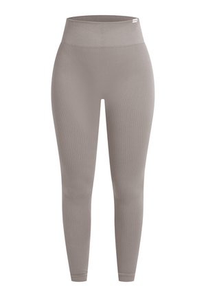Geribbelde, high-waisted leggings in een gedempt taupe kleur. Gemaakt van rekbare stof, met een naadloos ontwerp en een aansluitende pasvorm.